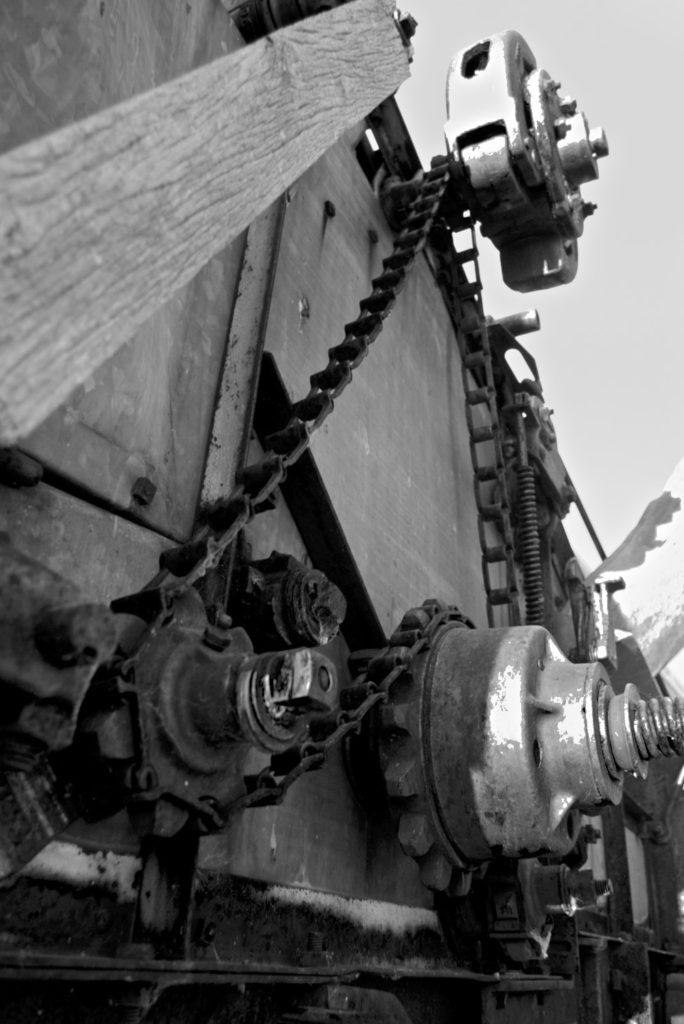 Abstract, chain drive on abandoned farm machinery