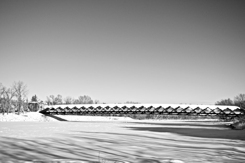 peace bridge and river, winter snow