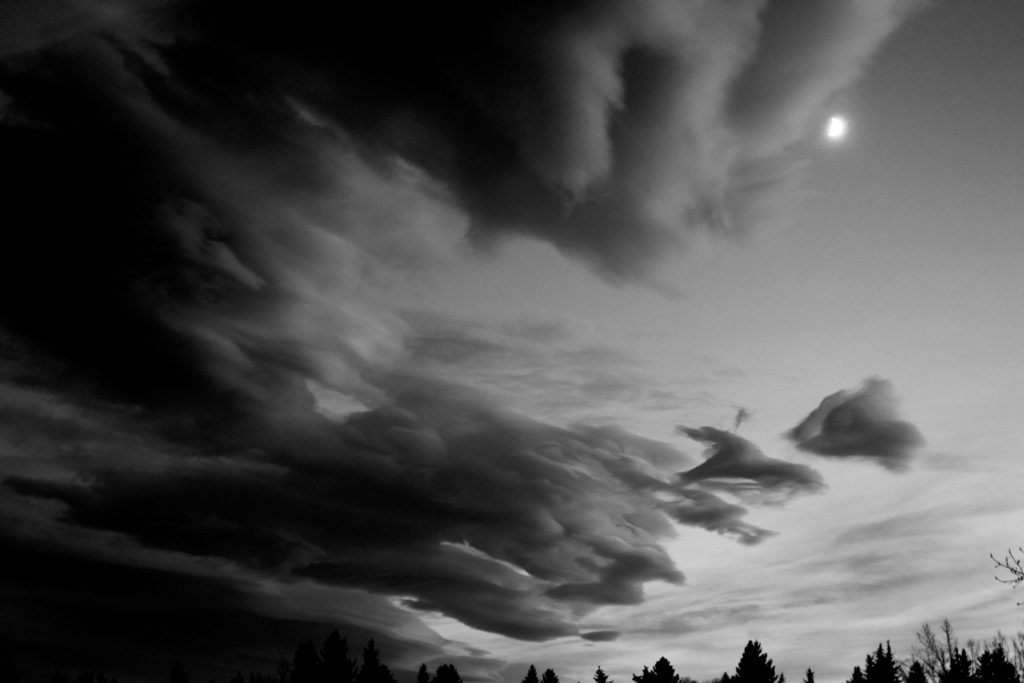 Dramatic clouds and moon
