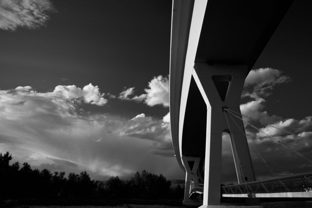 freeway bridge and clouds